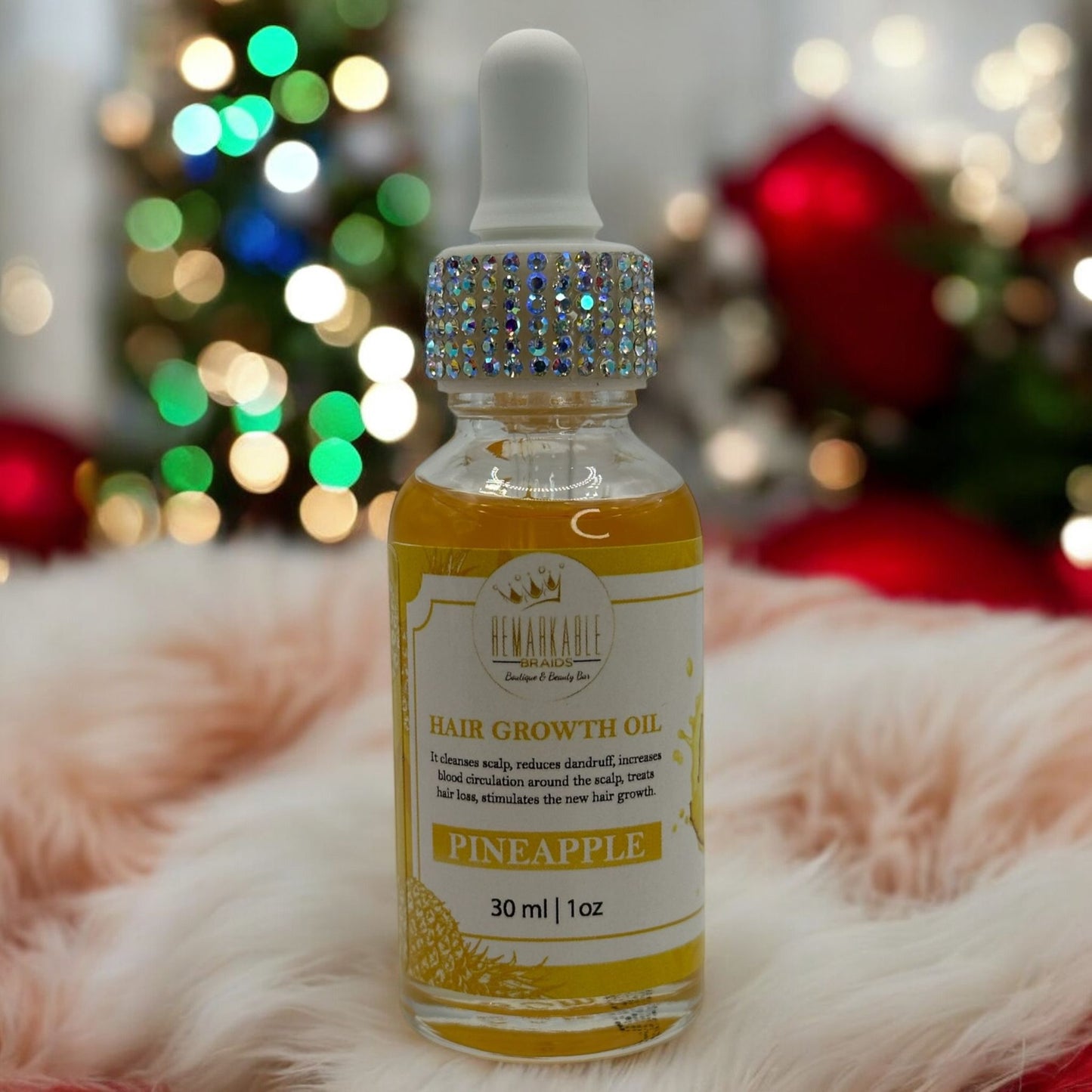 Hair growth oil bottle with decorative dropper on a festive background