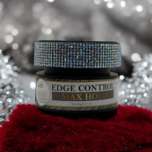Edge Control Max Hold gel jar by Remarkable Braids with rhinestone lid on white marble surface with crystal ornaments