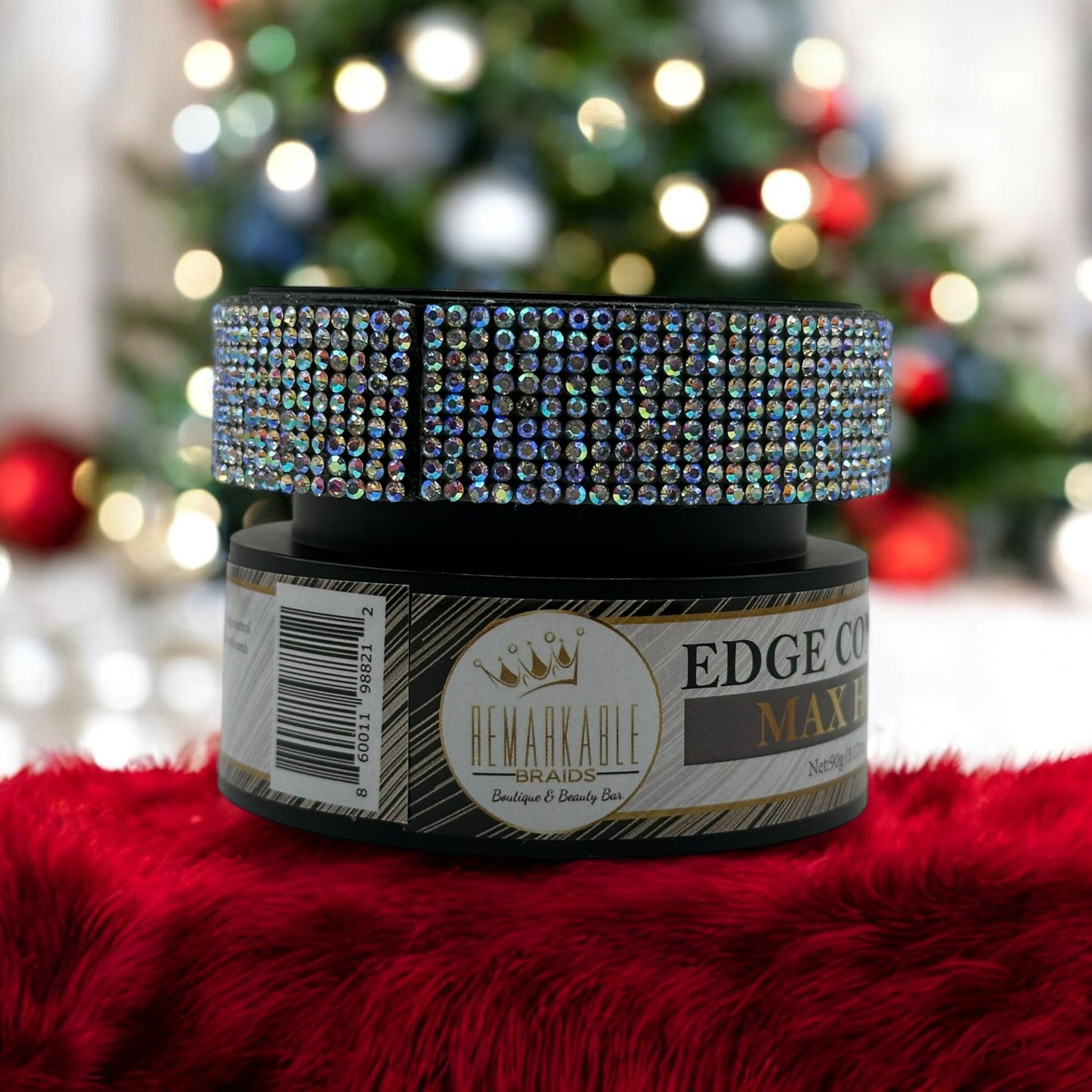 Edge Control Max Hold jar by Remarkable Braids with rhinestone lid on festive red velvet background