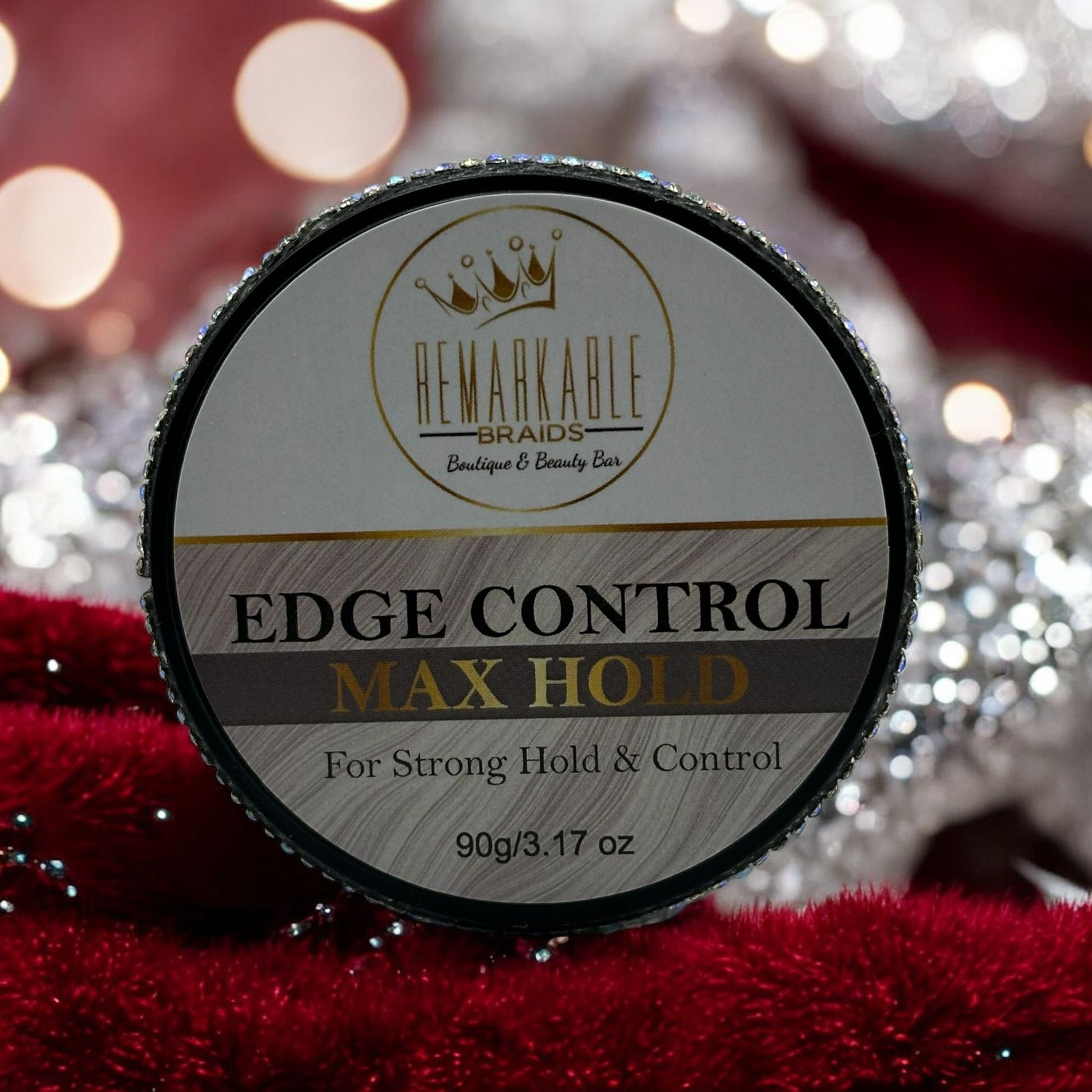Edge control product container with 'Remarkable Braids' branding on a red and silver background.