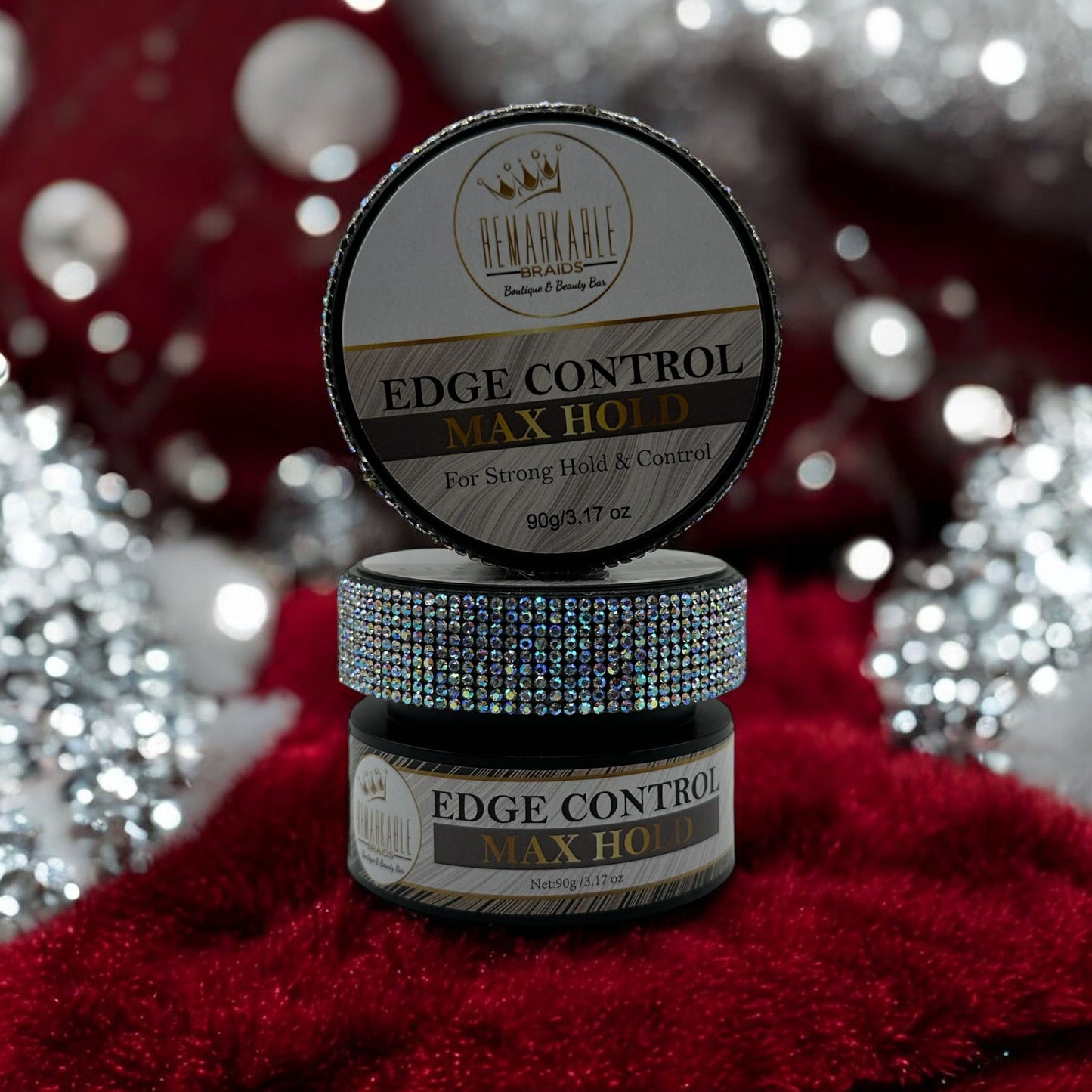 Edge Control Max Hold gel by Remarkable Braids with rhinestone lid in snowy holiday setting with twinkling lights