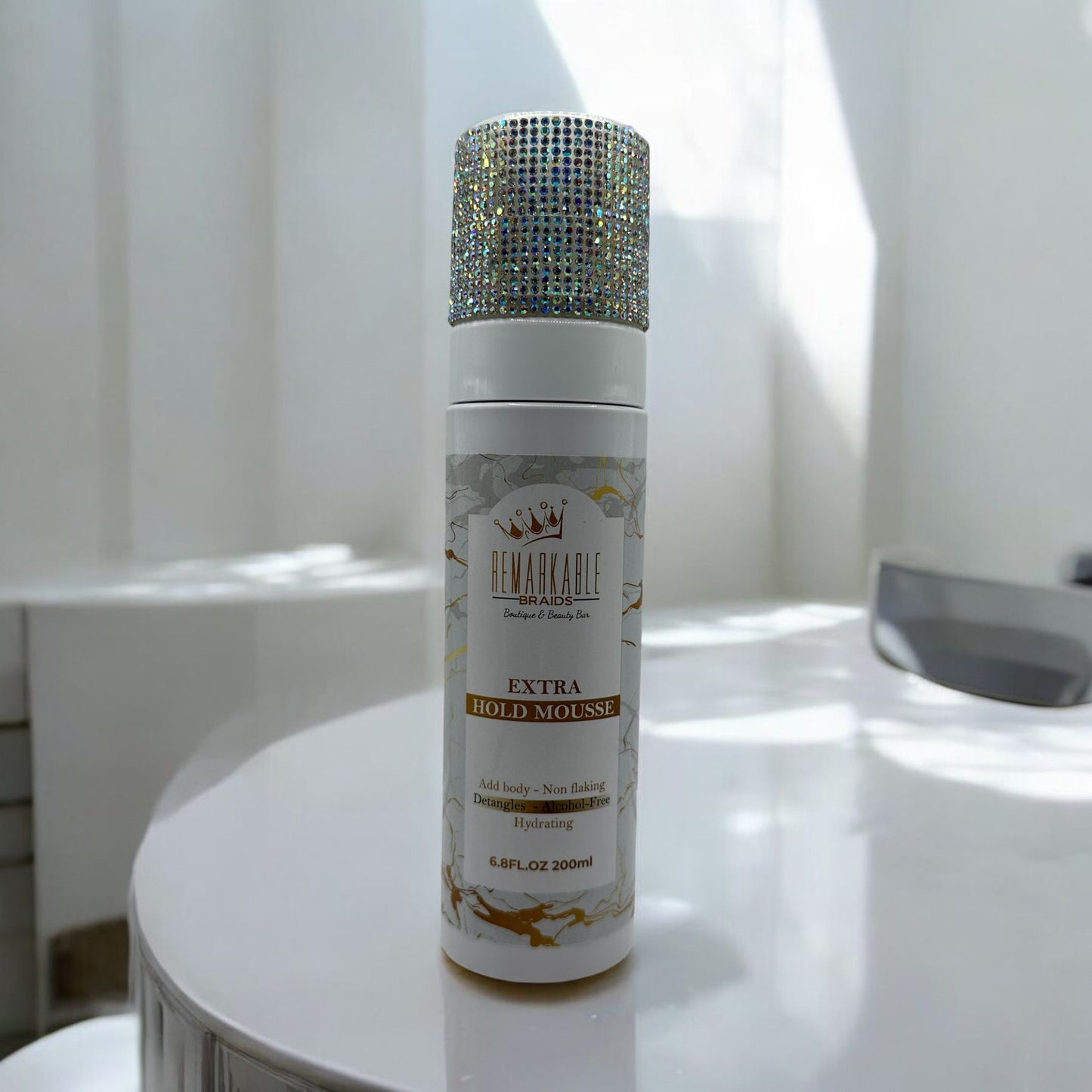 Remarkable Extra Hold Hair Mousse front view, 200ml styling mousse on a bathroom counter