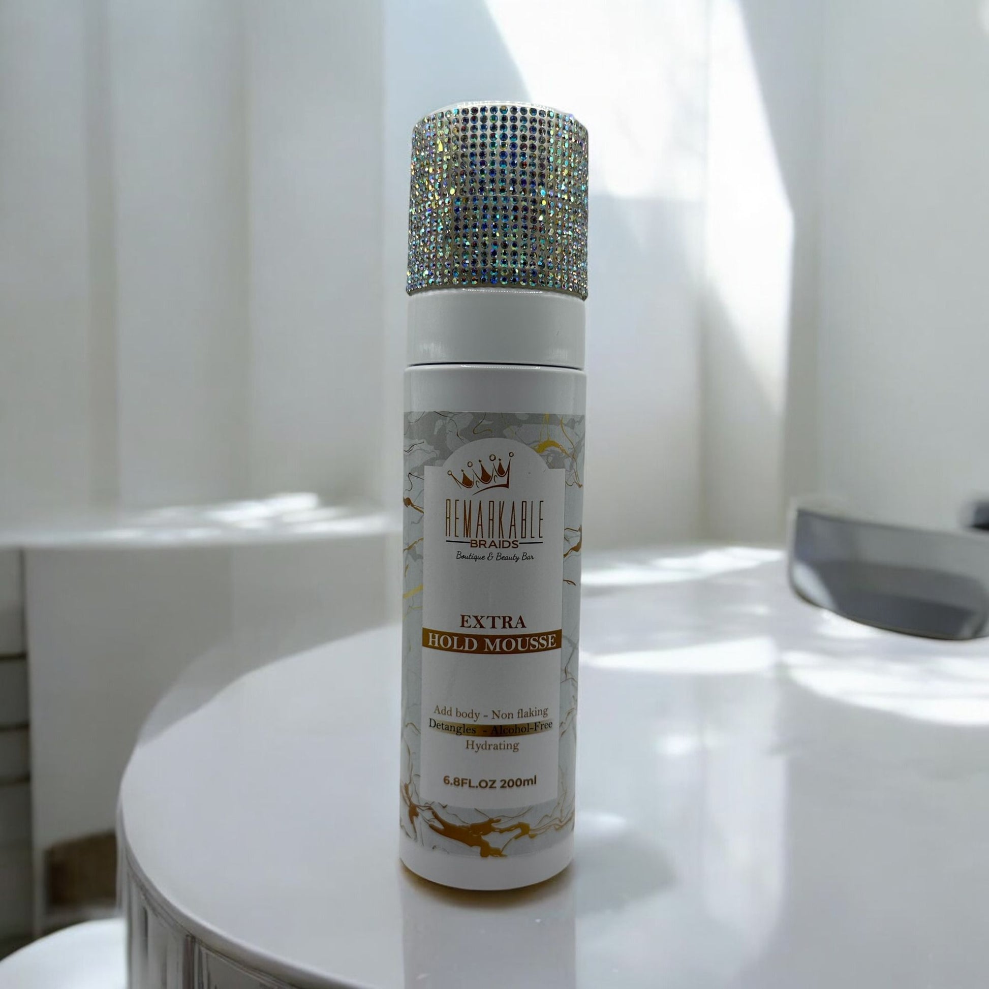 Remarkable Extra Hold Hair Mousse front view, 200ml styling mousse on a bathroom counter