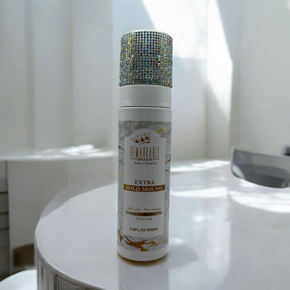 Remarkable Extra Hold Hair Mousse front view, 200ml styling mousse on a bathroom counter