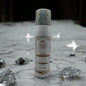 Remarkable Extra Hold Hair Mousse bottle with decorative cap on a marble surface with crystals